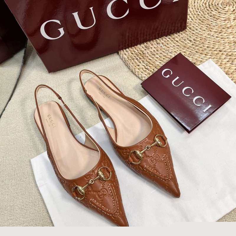 G*u*i sandals